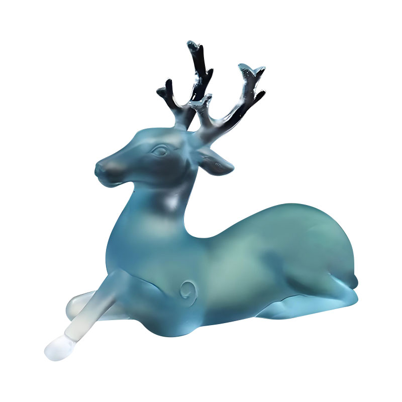 青いガラスの鹿の形をしたブラシホルダー